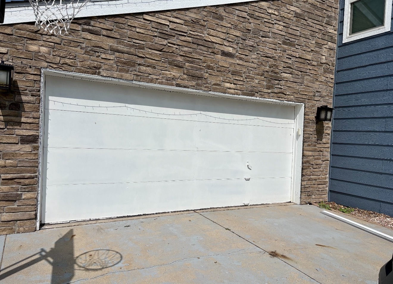 Old flat garage door before replacement