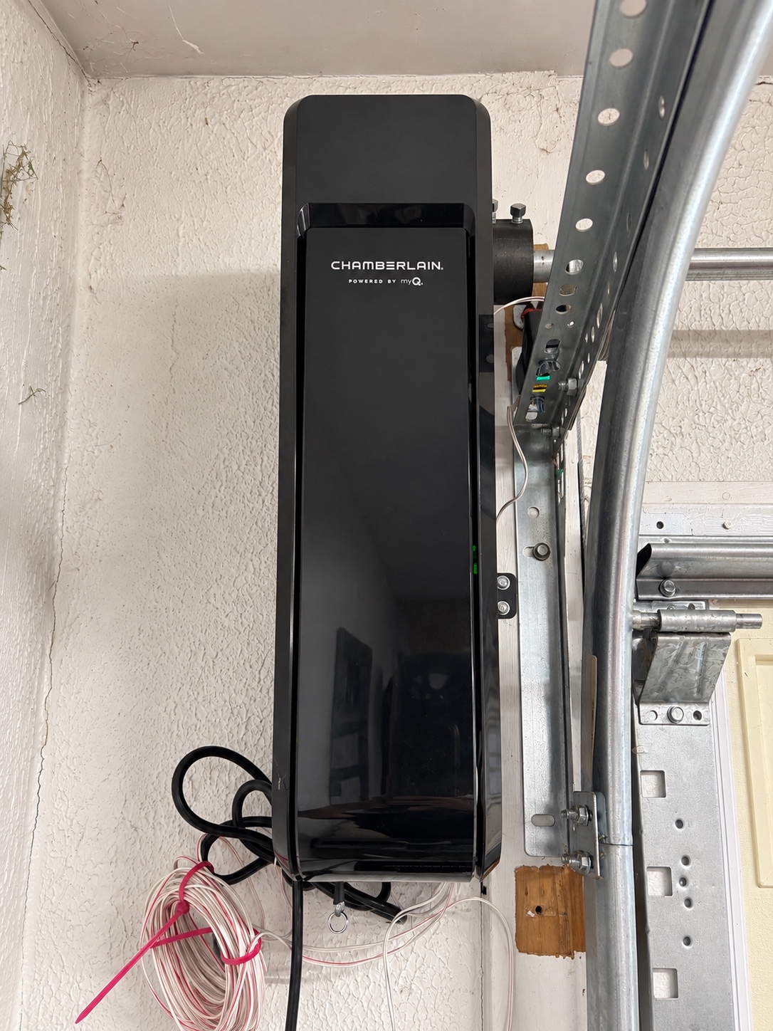 Black Chamberlain wall-mount garage door opener